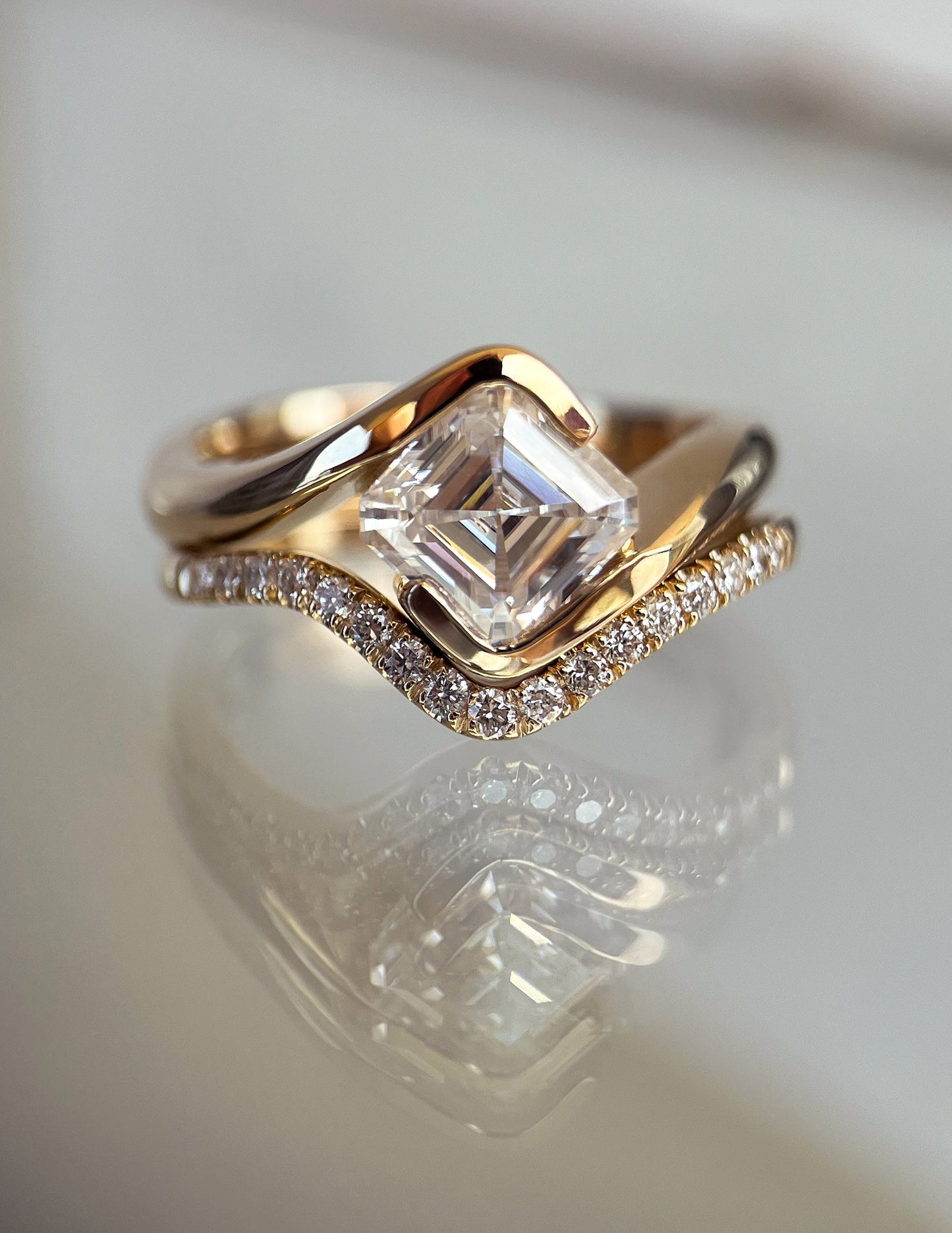 1.5 CT Asscher Lab Grown Curved Shank Engagement Ring With Minimal Pave Stacking Band