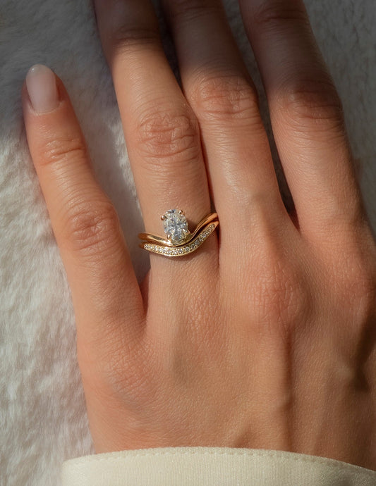 1 CT Oval Cut Solitaire Lab Grown Diamond Ring With Sunrise Styled Wedding Band