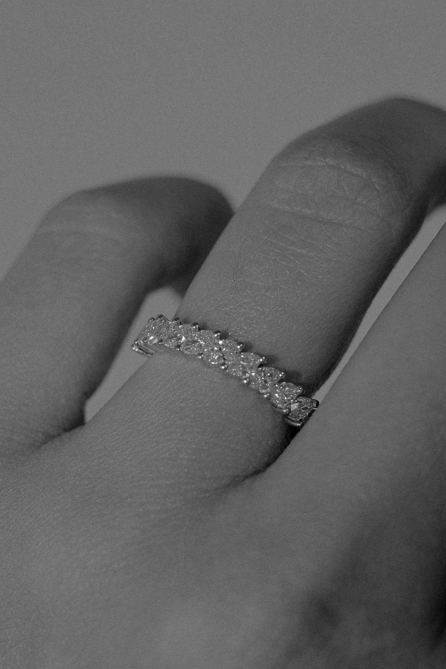 0.13 TCW Round Twisted Moissanite Wedding Band