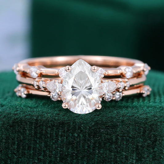 1.0 CT Pear Moissanite Three Stone Bridal Ring Set 1