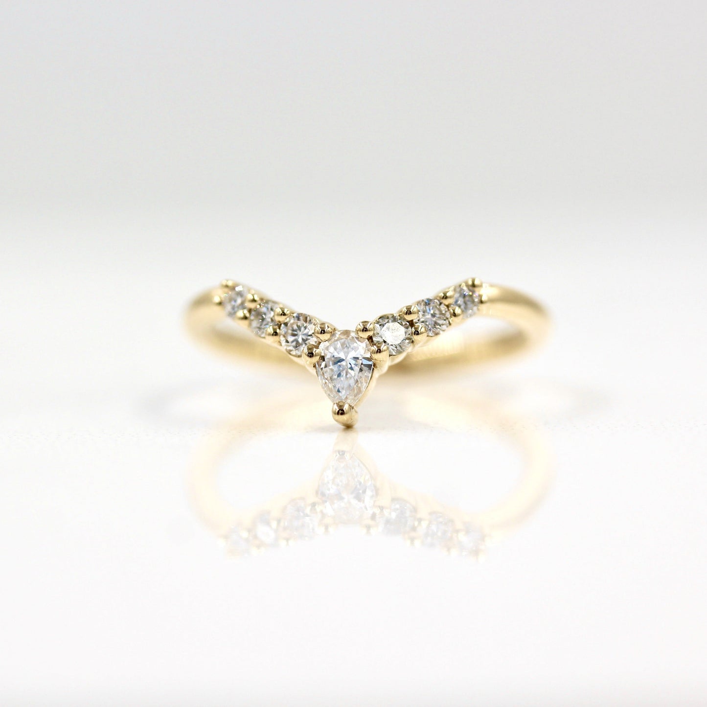 0.31 TCW Round & Pear Cut Curved Moissanite Wedding Band 4