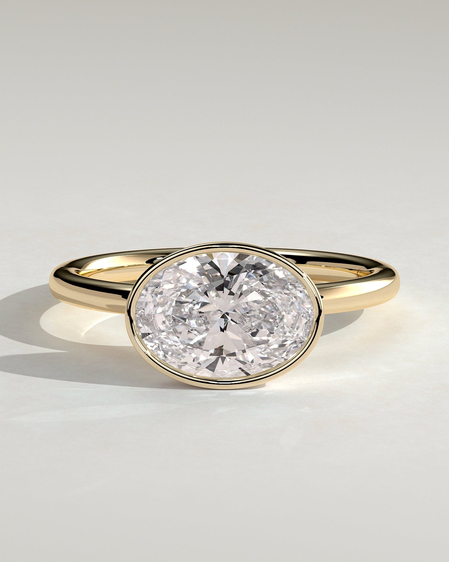Oval Bezel East West Solitaire Engagement Ring – 2 CT Lab Grown Diamond