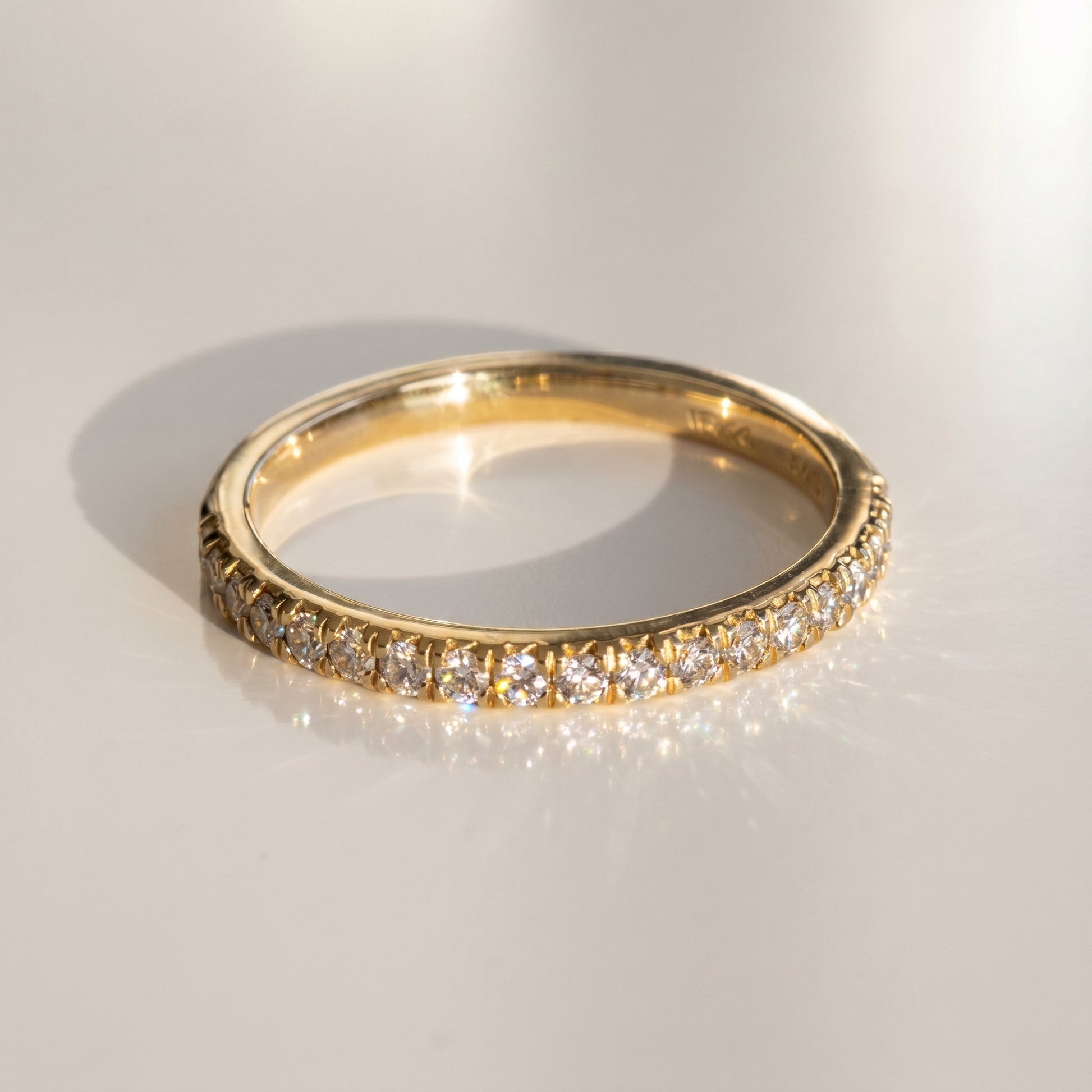 0.13 TCW Round Twisted DEF/VVS Lab Grown Diamond Wedding Band