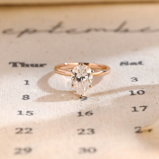 Stunning 3.0 CT Pear Moissanite Engagement Ring with Hidden Halo Design 1
