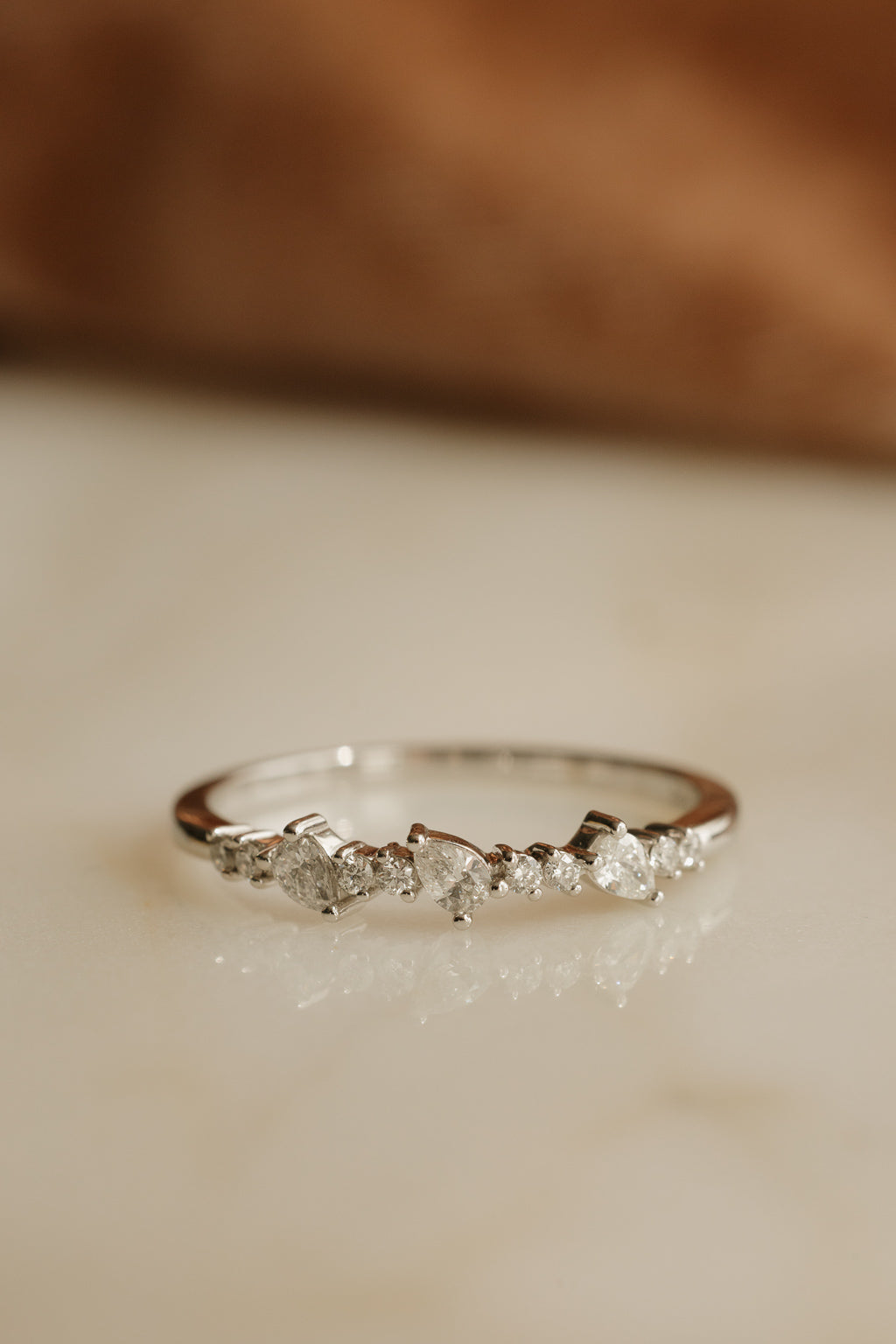 0.13 TCW Round Twisted Moissanite Wedding Band
