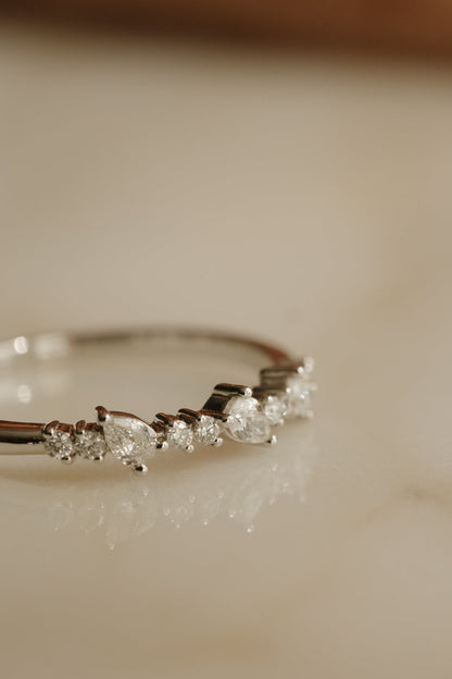 0.13 TCW Round Twisted Moissanite Wedding Band