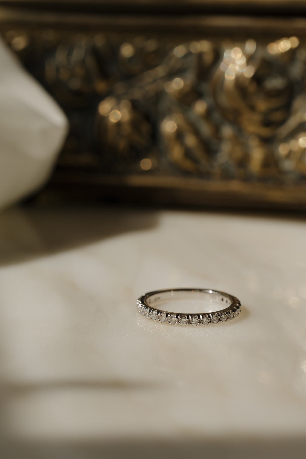 0.13 TCW Round Twisted Moissanite Wedding Band