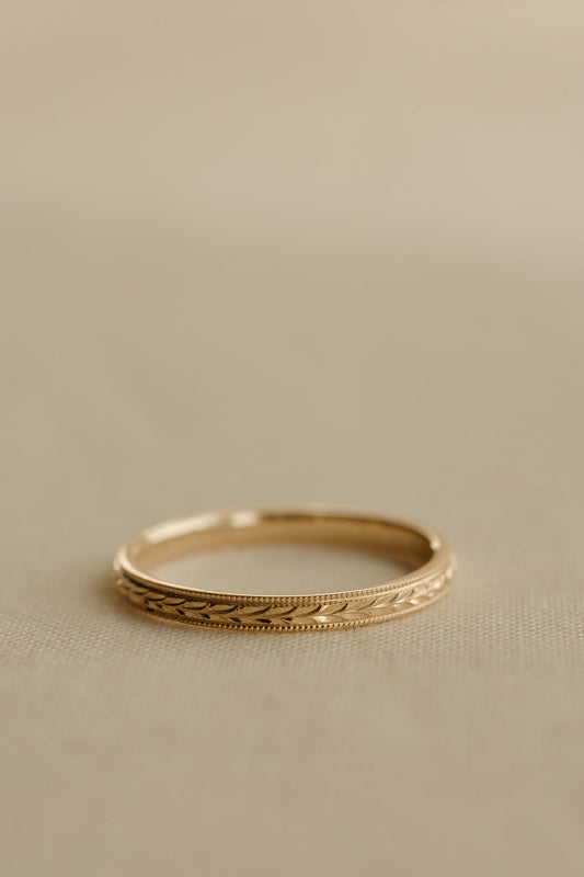 0.13 TCW Round Twisted Moissanite Wedding Band