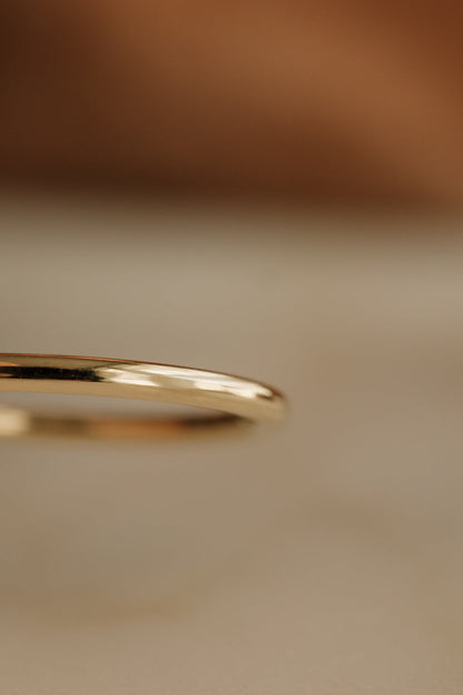 0.13 TCW Round Twisted Moissanite Wedding Band