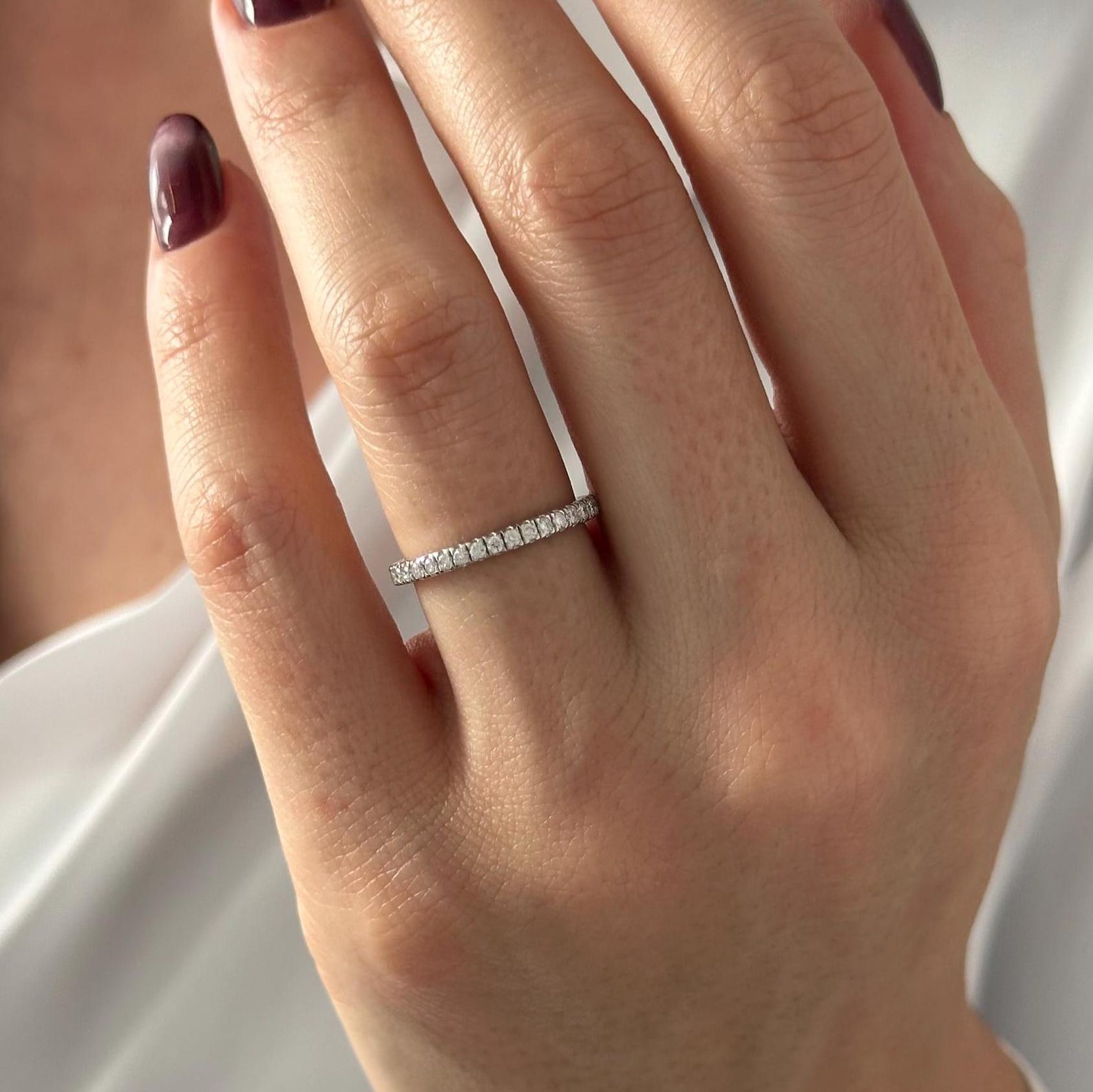 0.13 TCW Round Twisted DEF/VVS Lab Grown Diamond Wedding Band