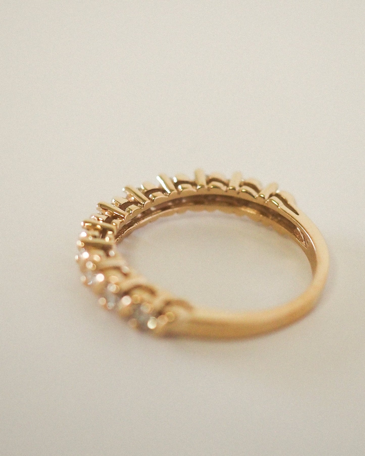 0.13 TCW Round Twisted Moissanite Wedding Band