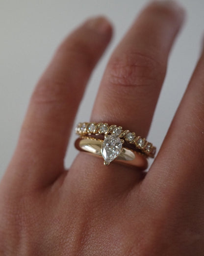 0.13 TCW Round Twisted Moissanite Wedding Band