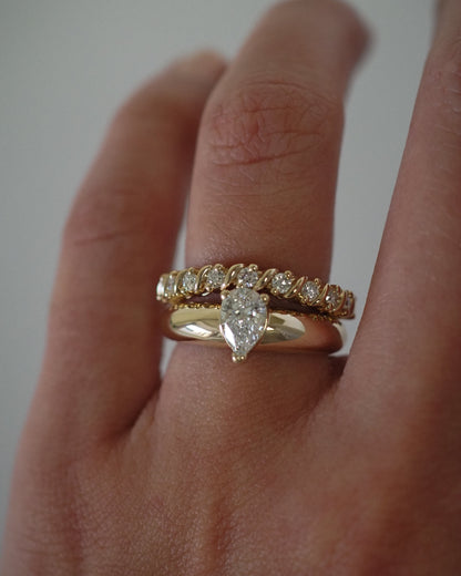 0.13 TCW Round Twisted Moissanite Wedding Band