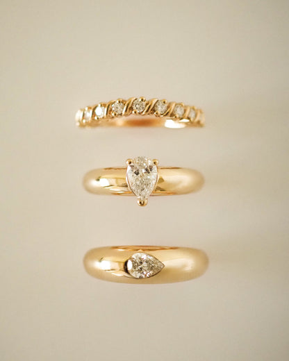 0.13 TCW Round Twisted Moissanite Wedding Band