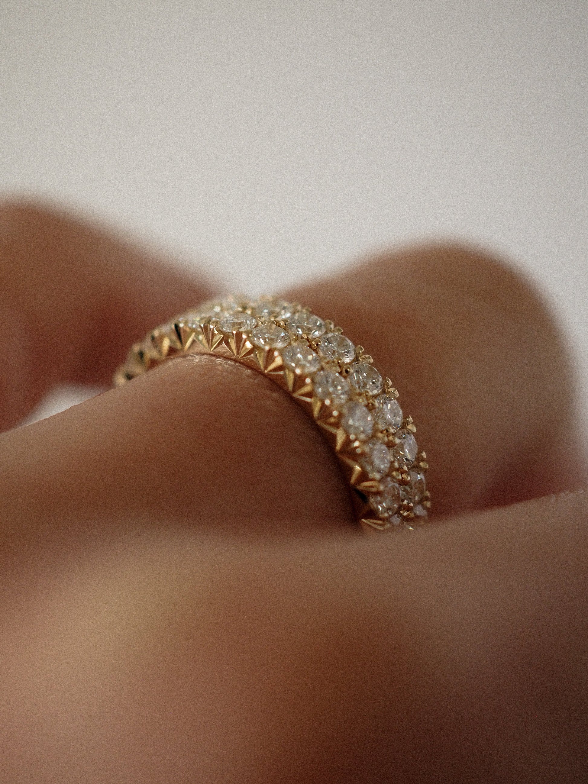 0.13 TCW Round Twisted Moissanite Wedding Band