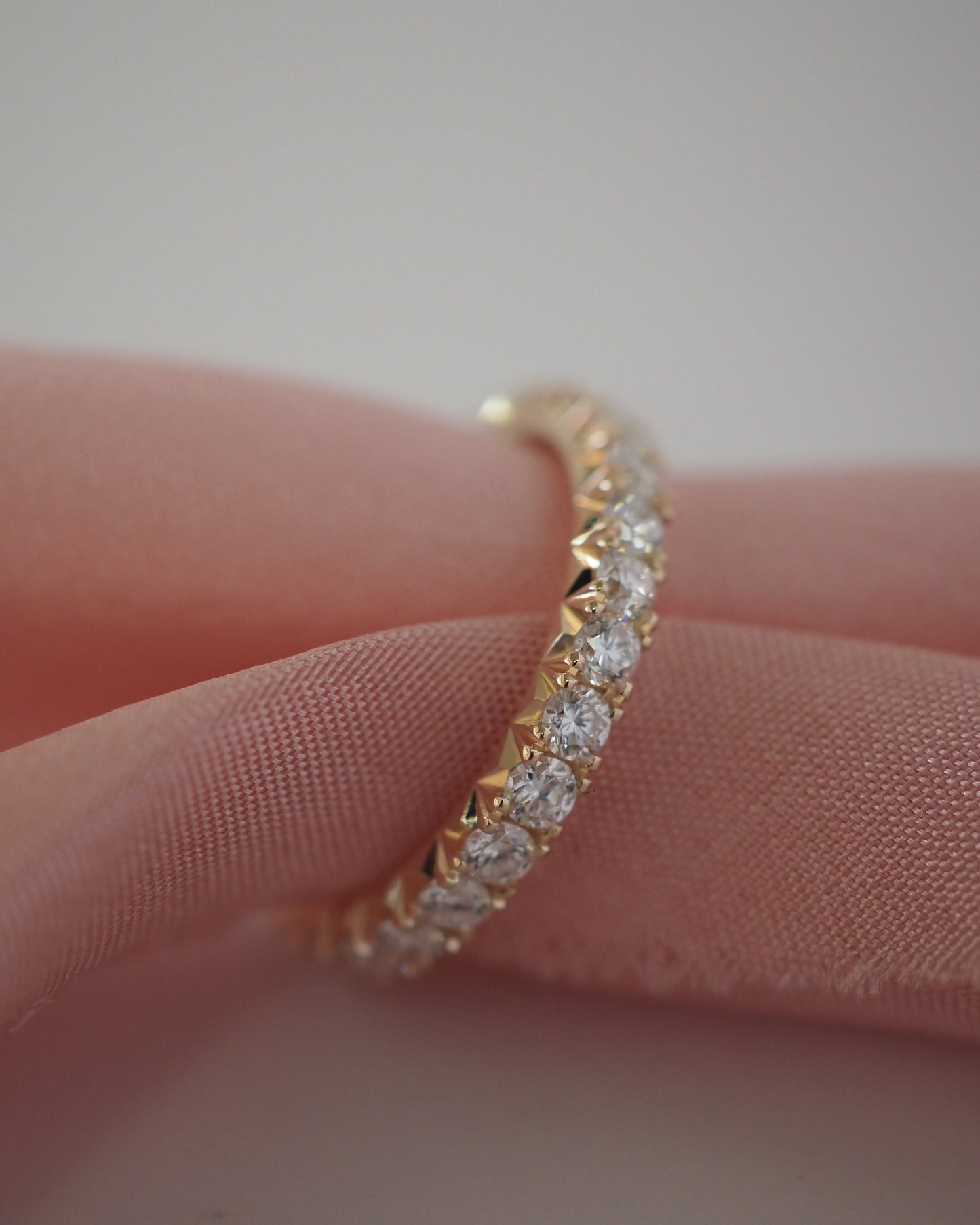0.13 TCW Round Twisted Moissanite Wedding Band