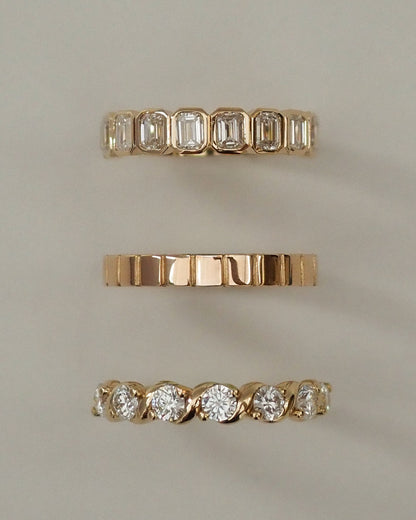 0.13 TCW Round Twisted Moissanite Wedding Band