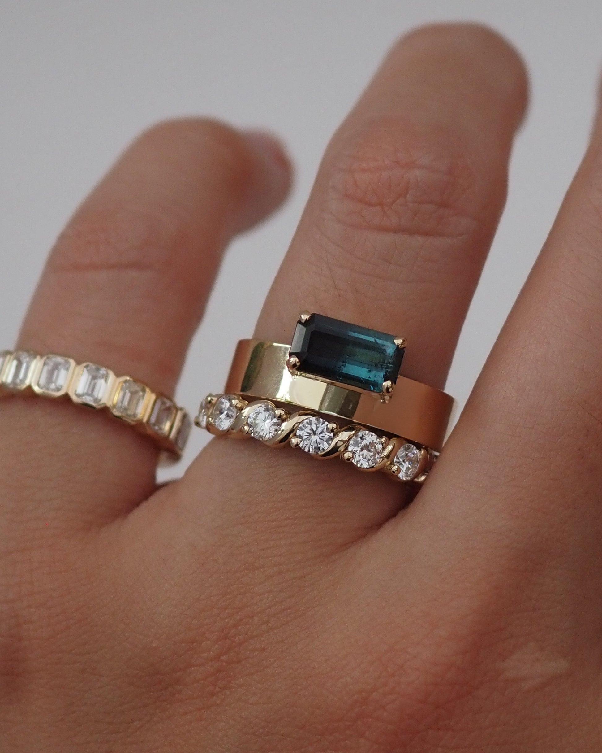 0.13 TCW Round Twisted Moissanite Wedding Band