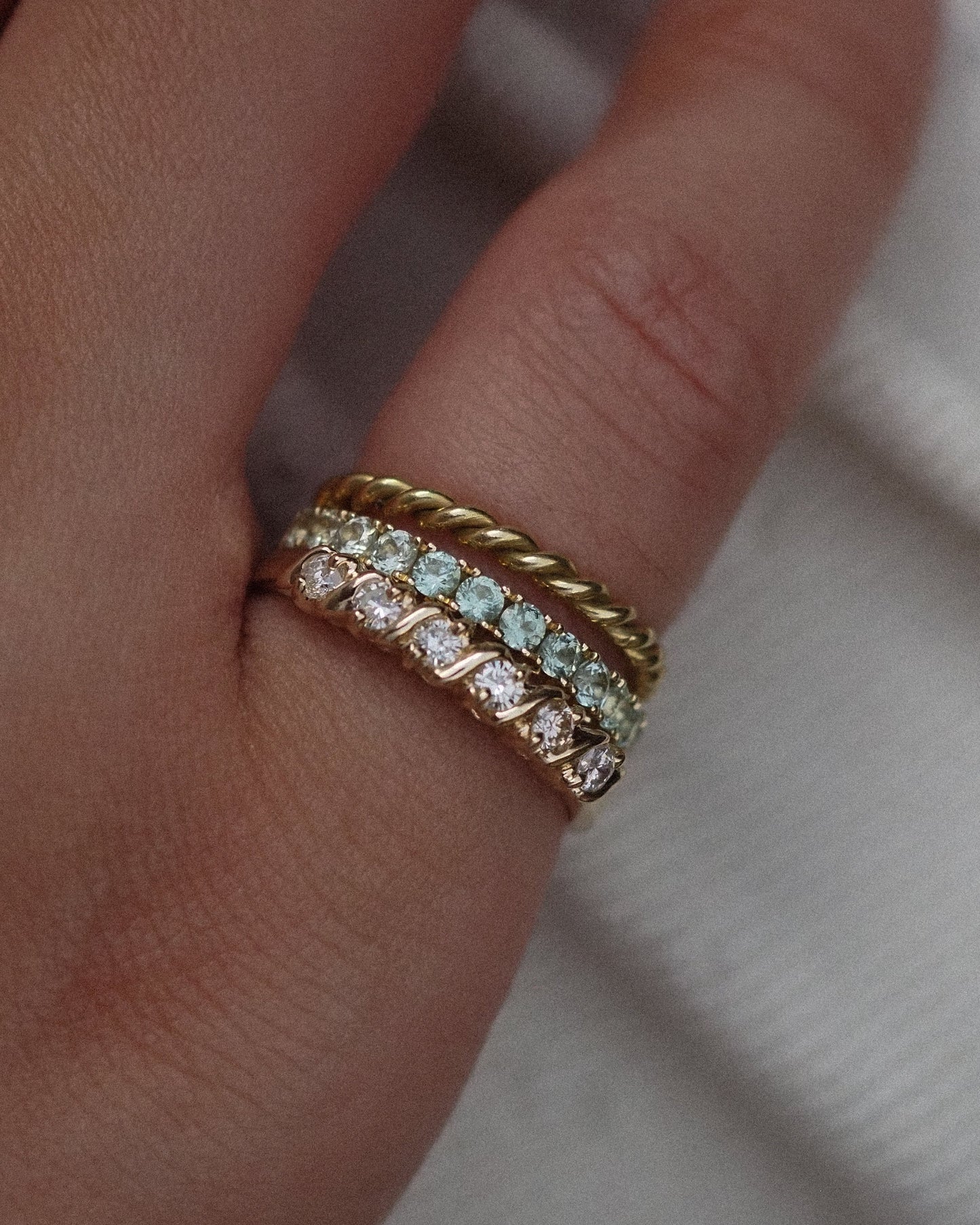 0.13 TCW Round Twisted Moissanite Wedding Band