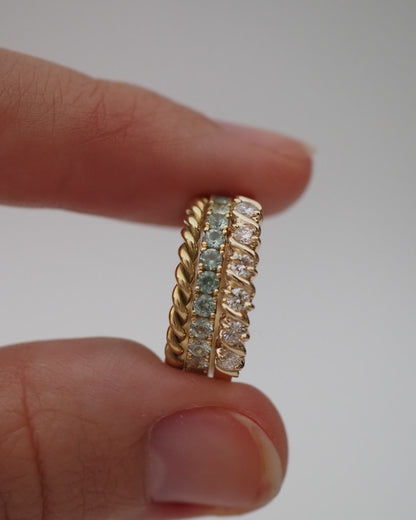 0.13 TCW Round Twisted Moissanite Wedding Band