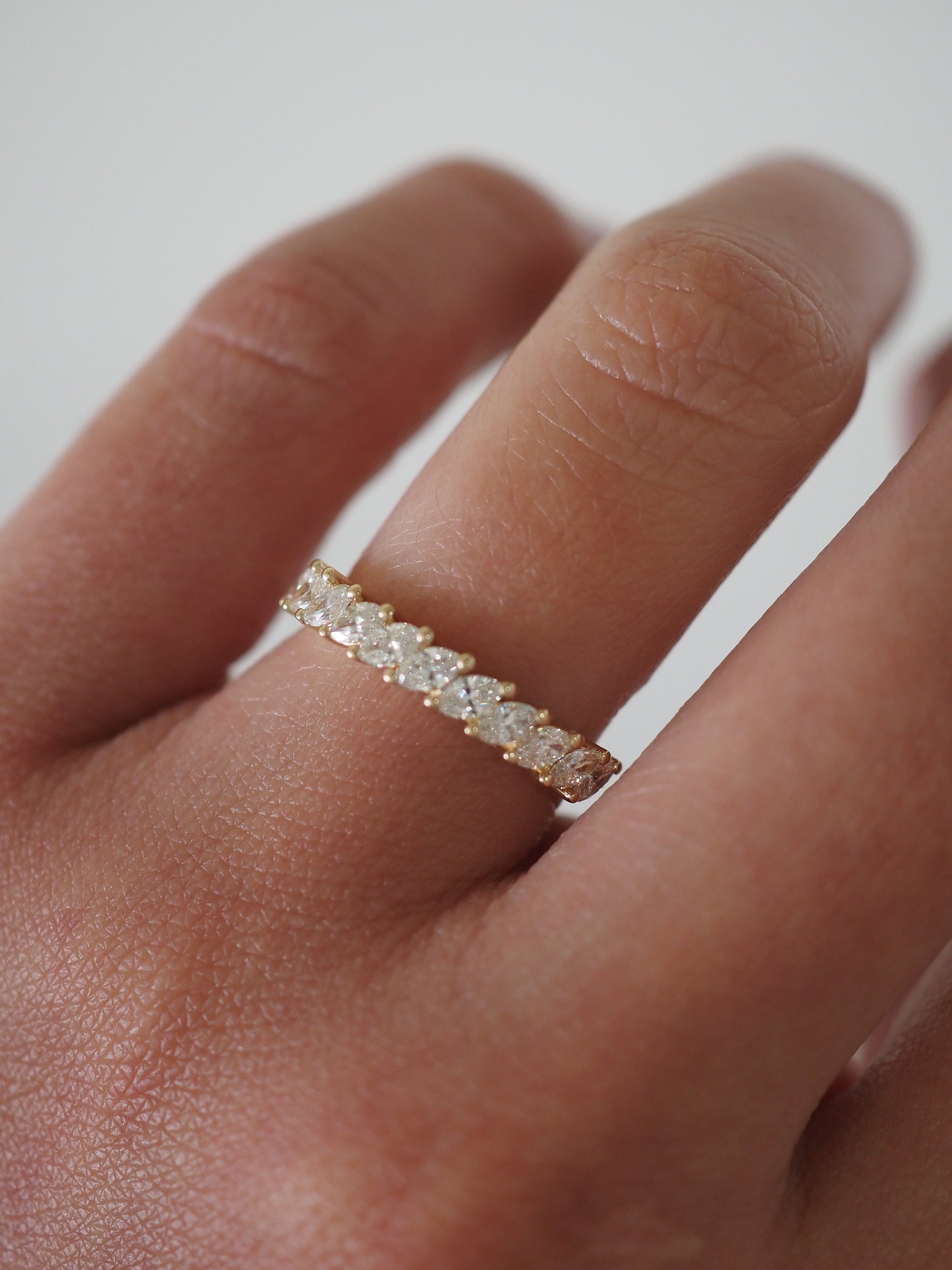 0.13 TCW Round Twisted Moissanite Wedding Band