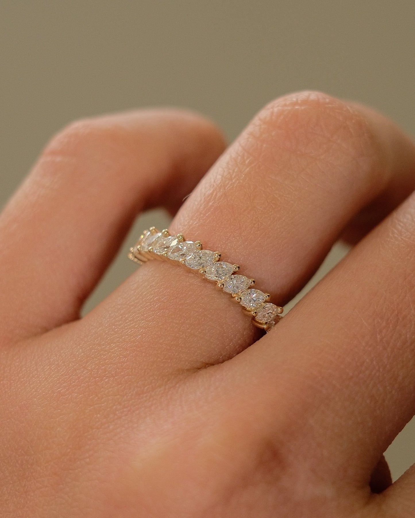 0.13 TCW Round Twisted Moissanite Wedding Band