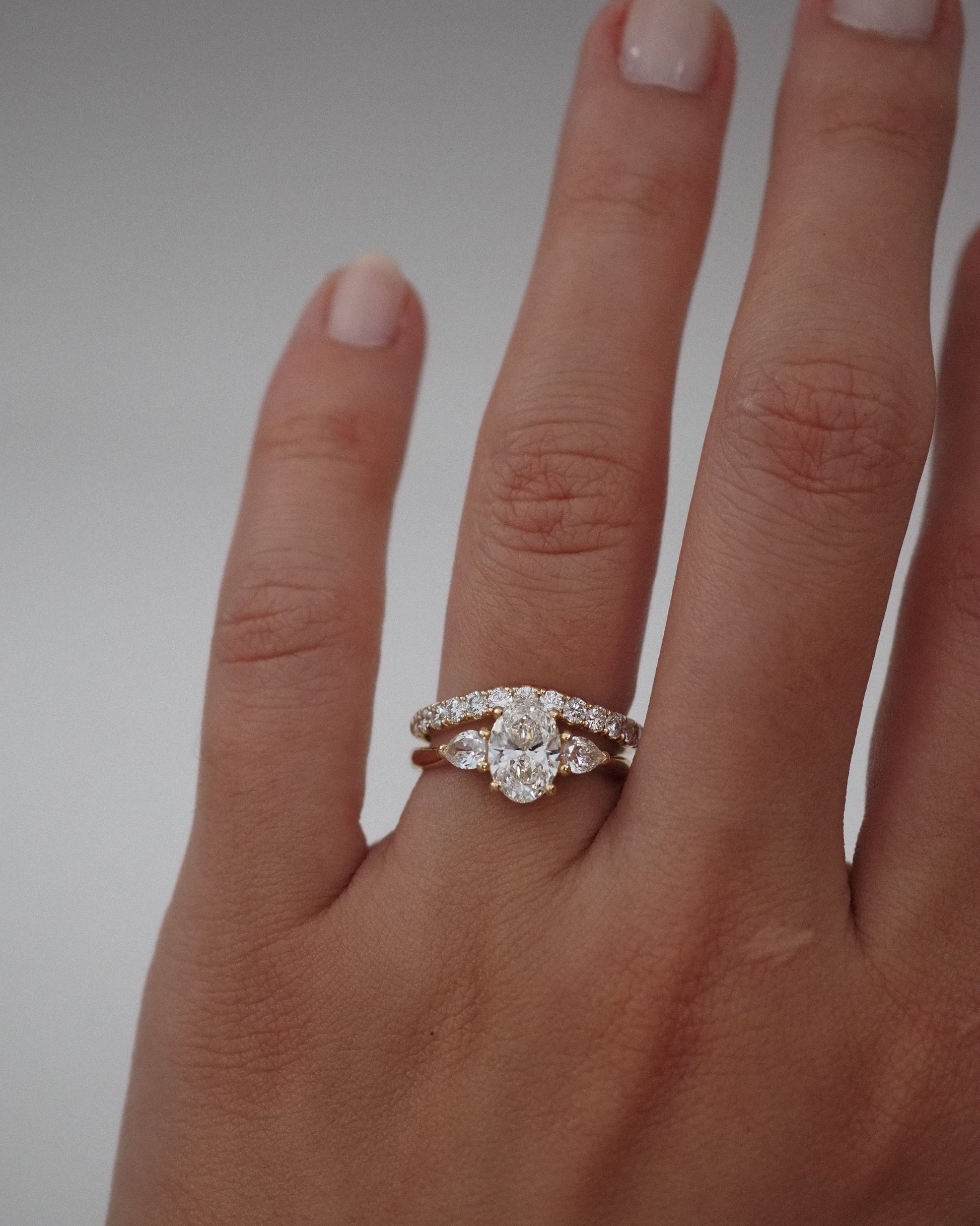 0.13 TCW Round Twisted Moissanite Wedding Band