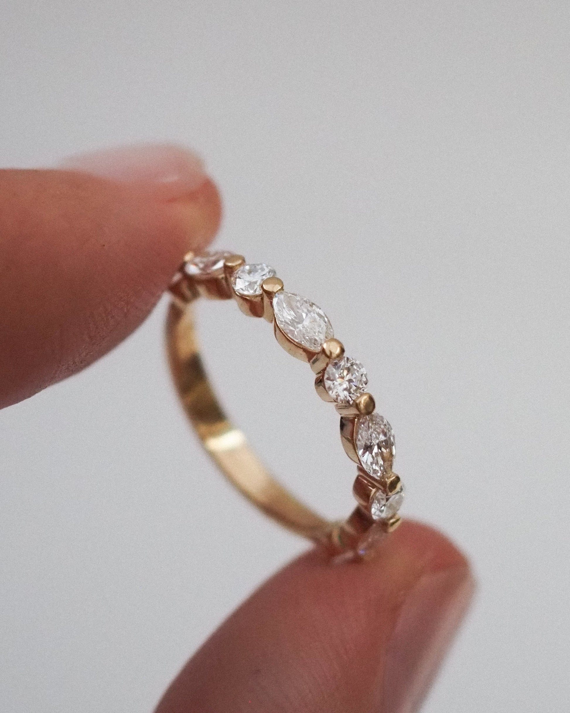0.13 TCW Round Twisted Moissanite Wedding Band