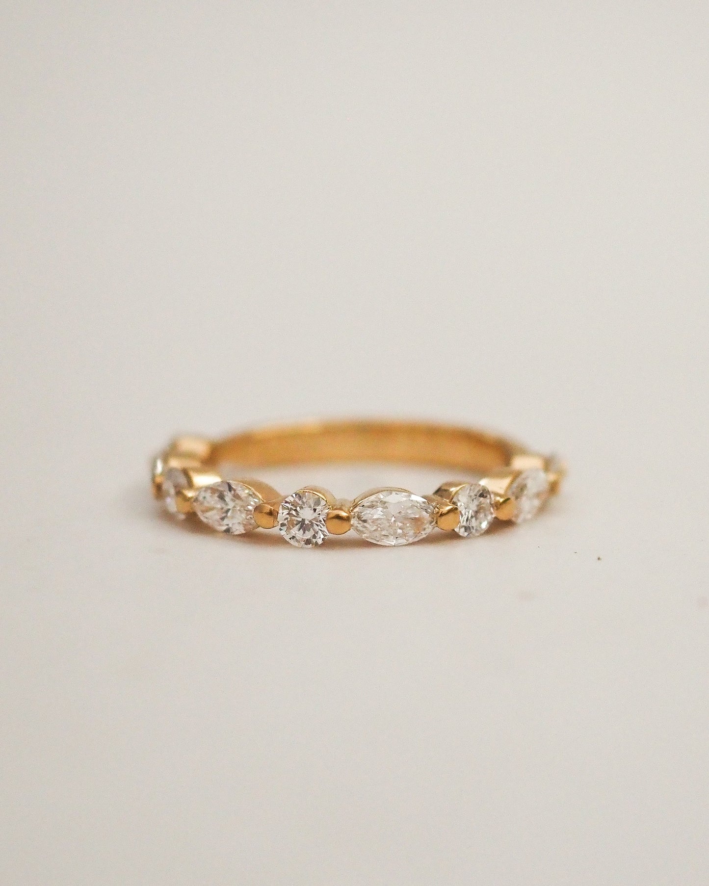 0.13 TCW Round Twisted Moissanite Wedding Band