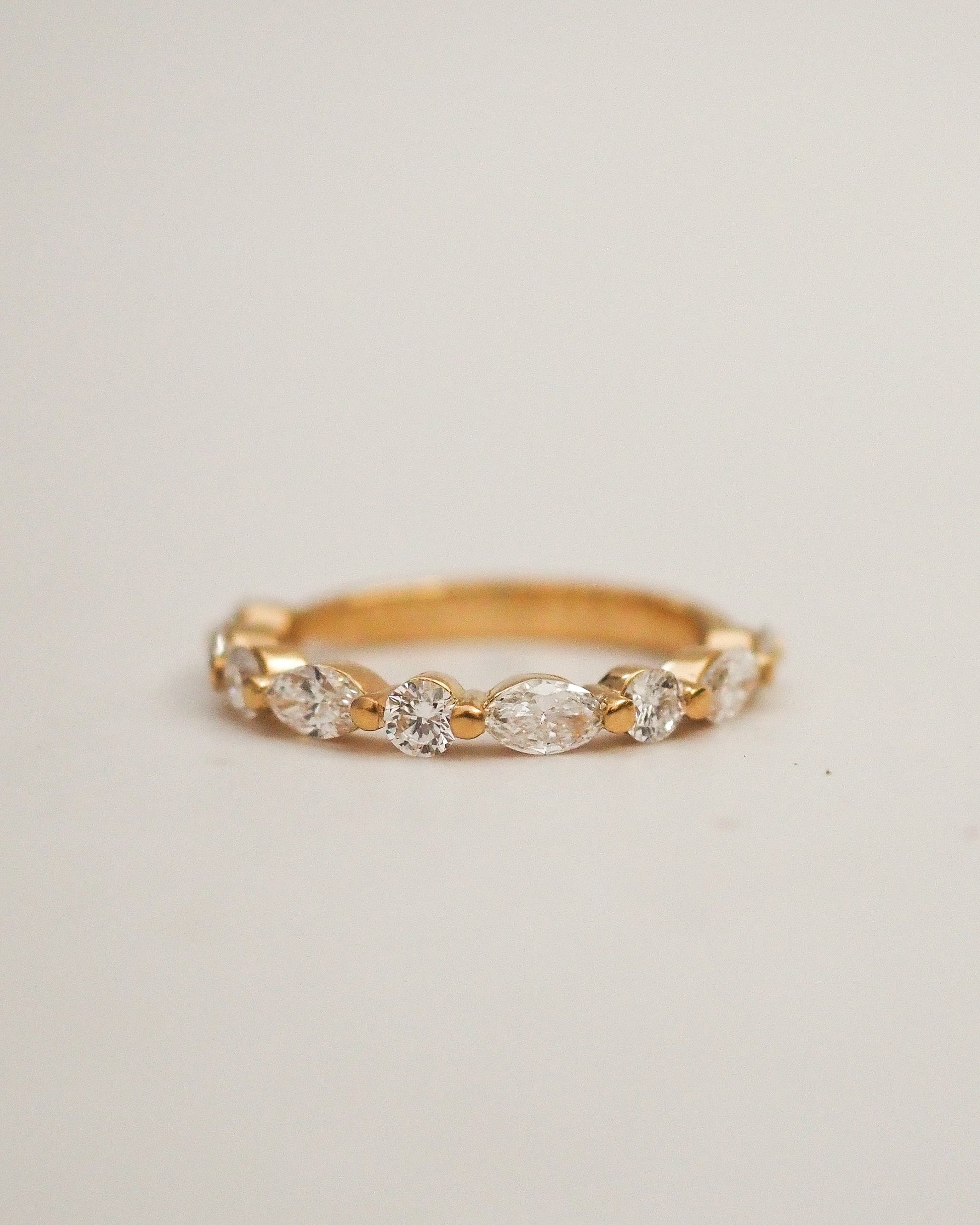 0.13 TCW Round Twisted Moissanite Wedding Band