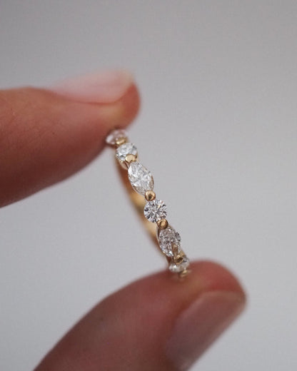 0.13 TCW Round Twisted Moissanite Wedding Band