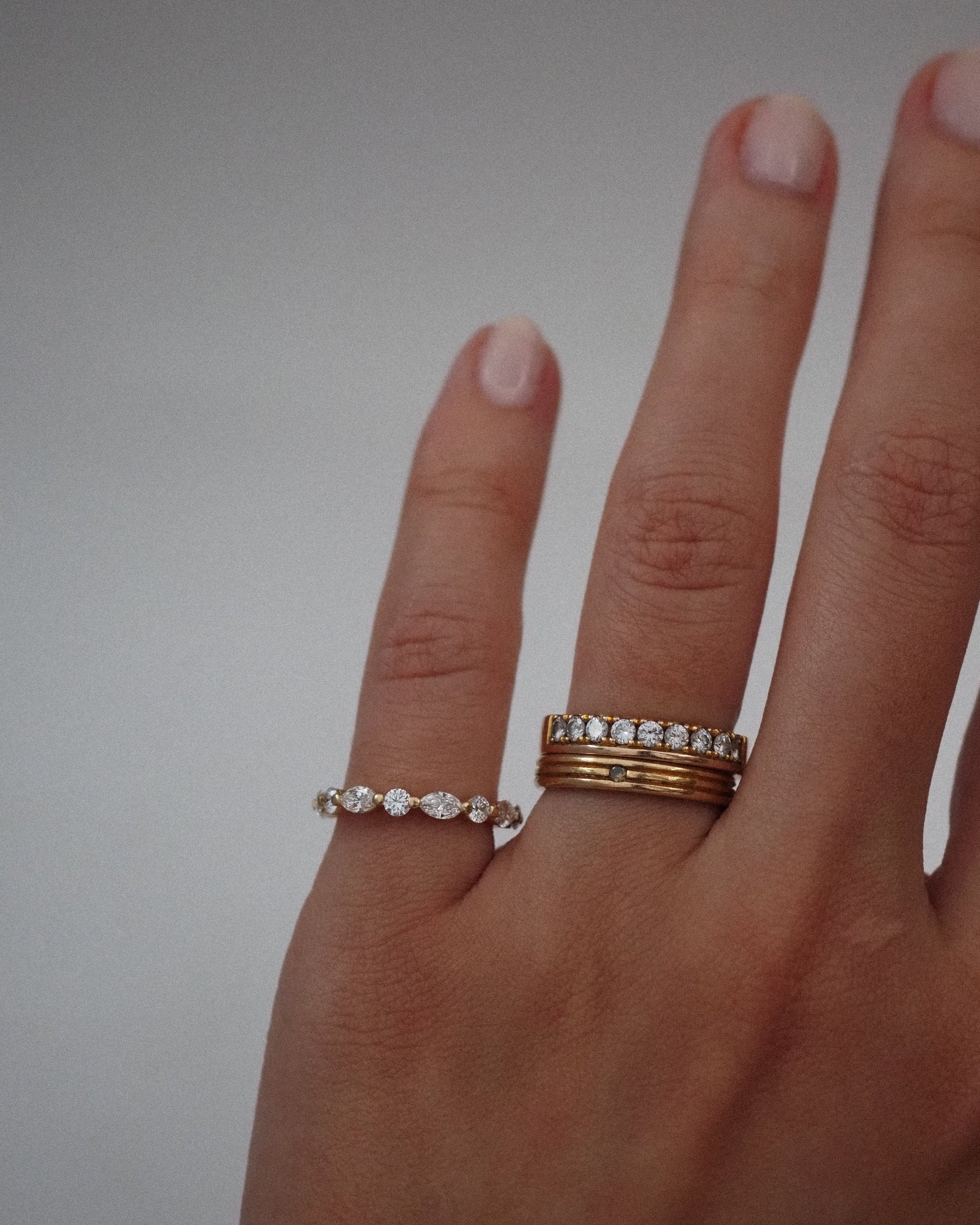 0.13 TCW Round Twisted Moissanite Wedding Band
