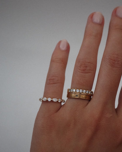 0.13 TCW Round Twisted Moissanite Wedding Band