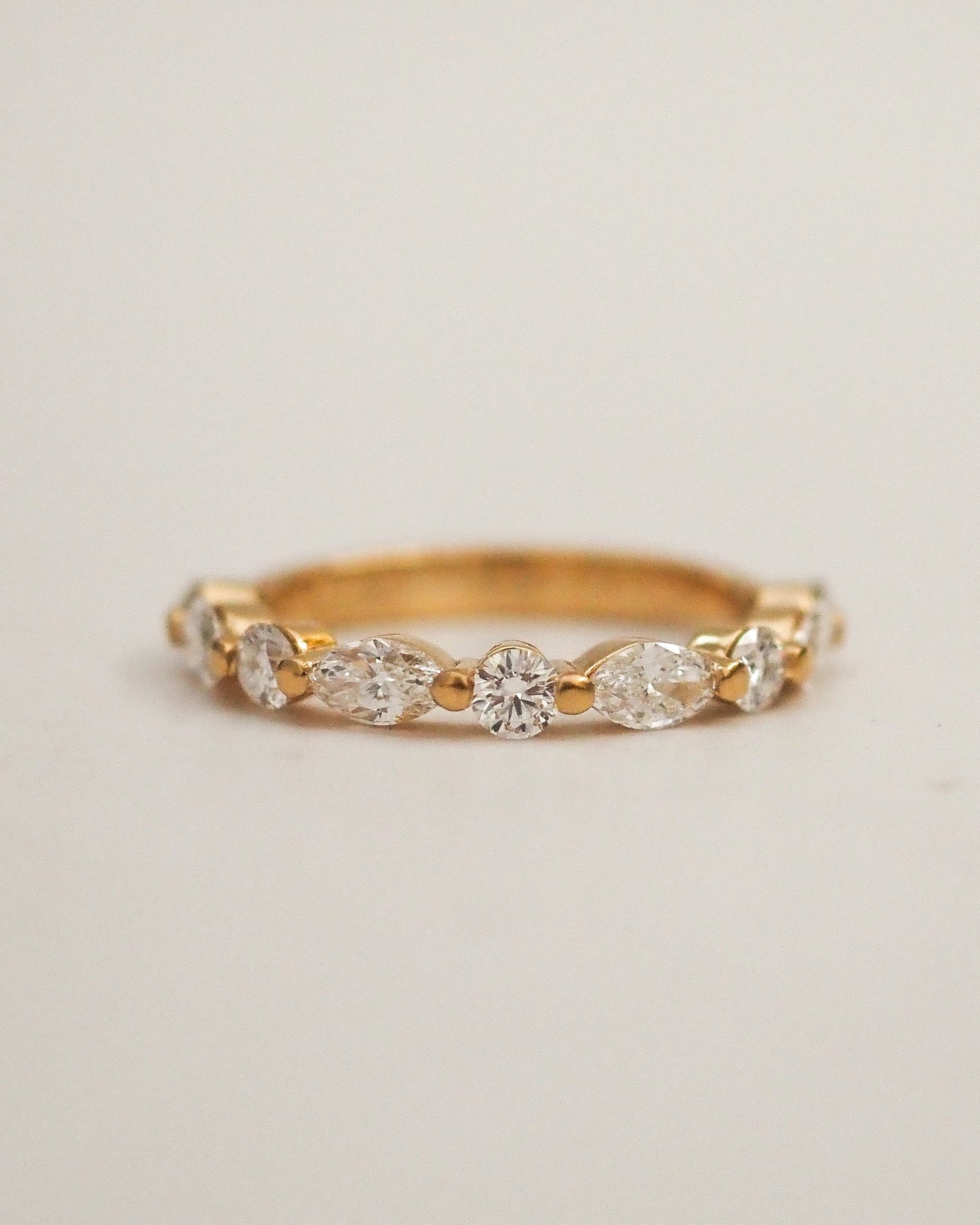 0.13 TCW Round Twisted Moissanite Wedding Band