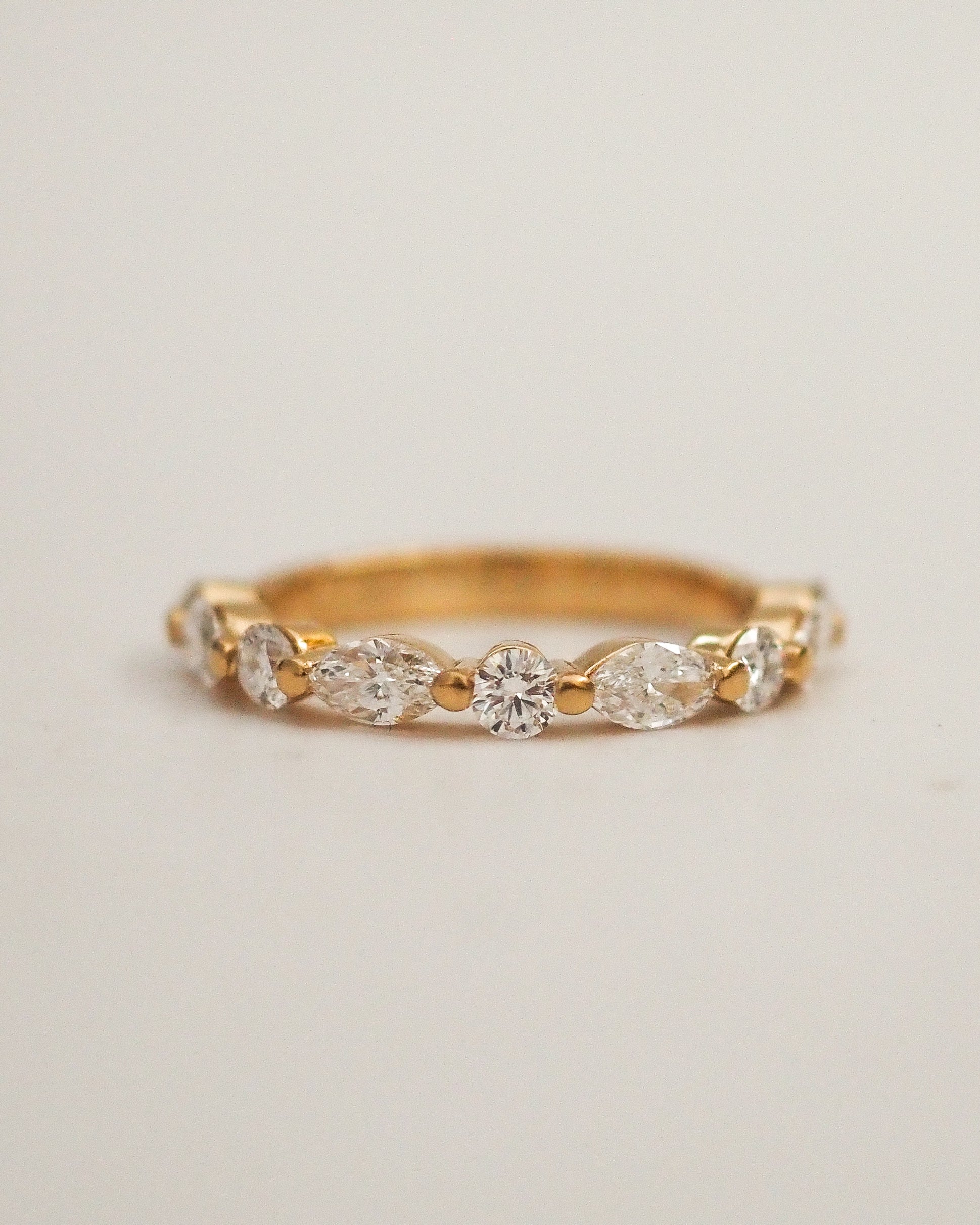 0.13 TCW Round Twisted Moissanite Wedding Band