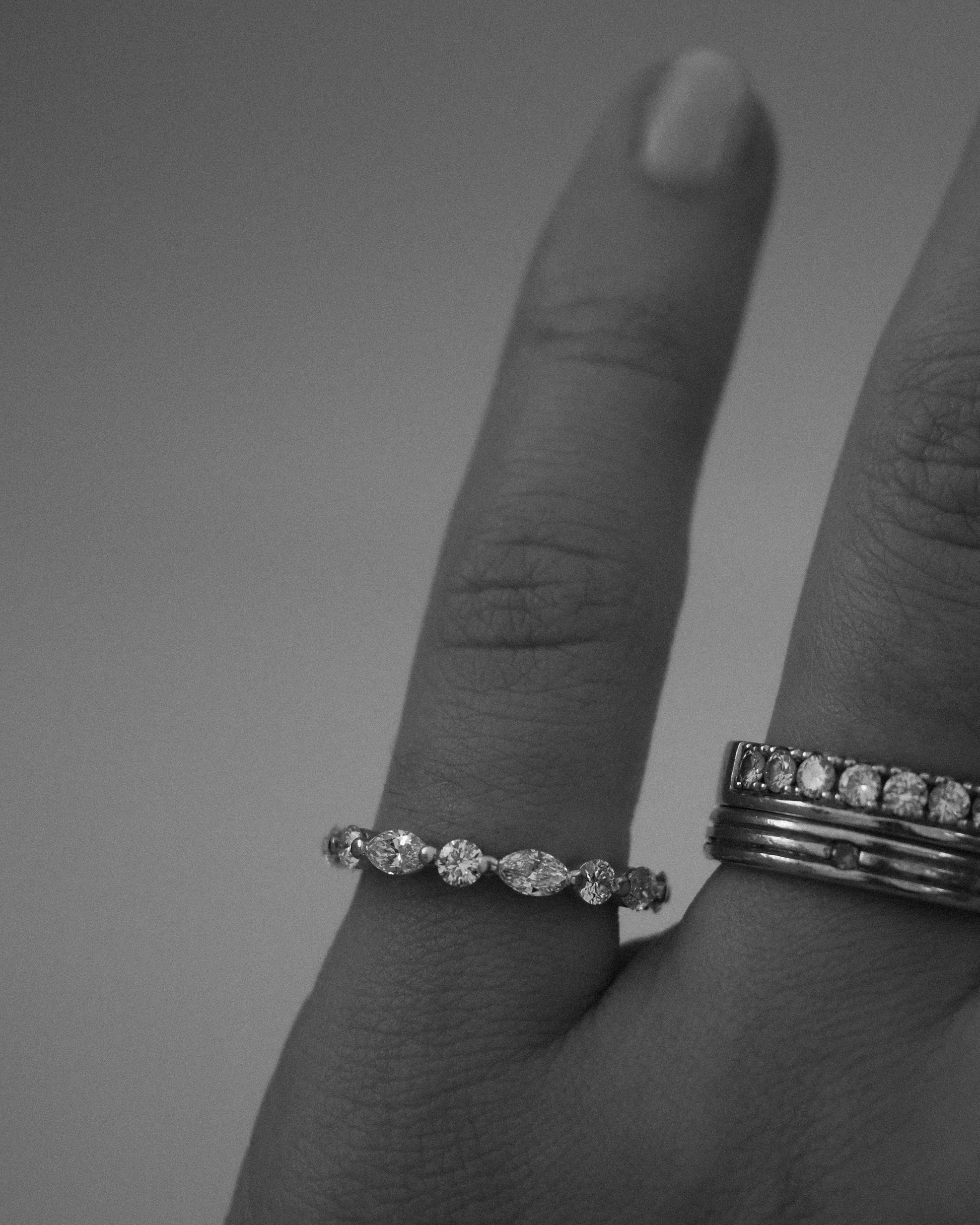 0.13 TCW Round Twisted Moissanite Wedding Band