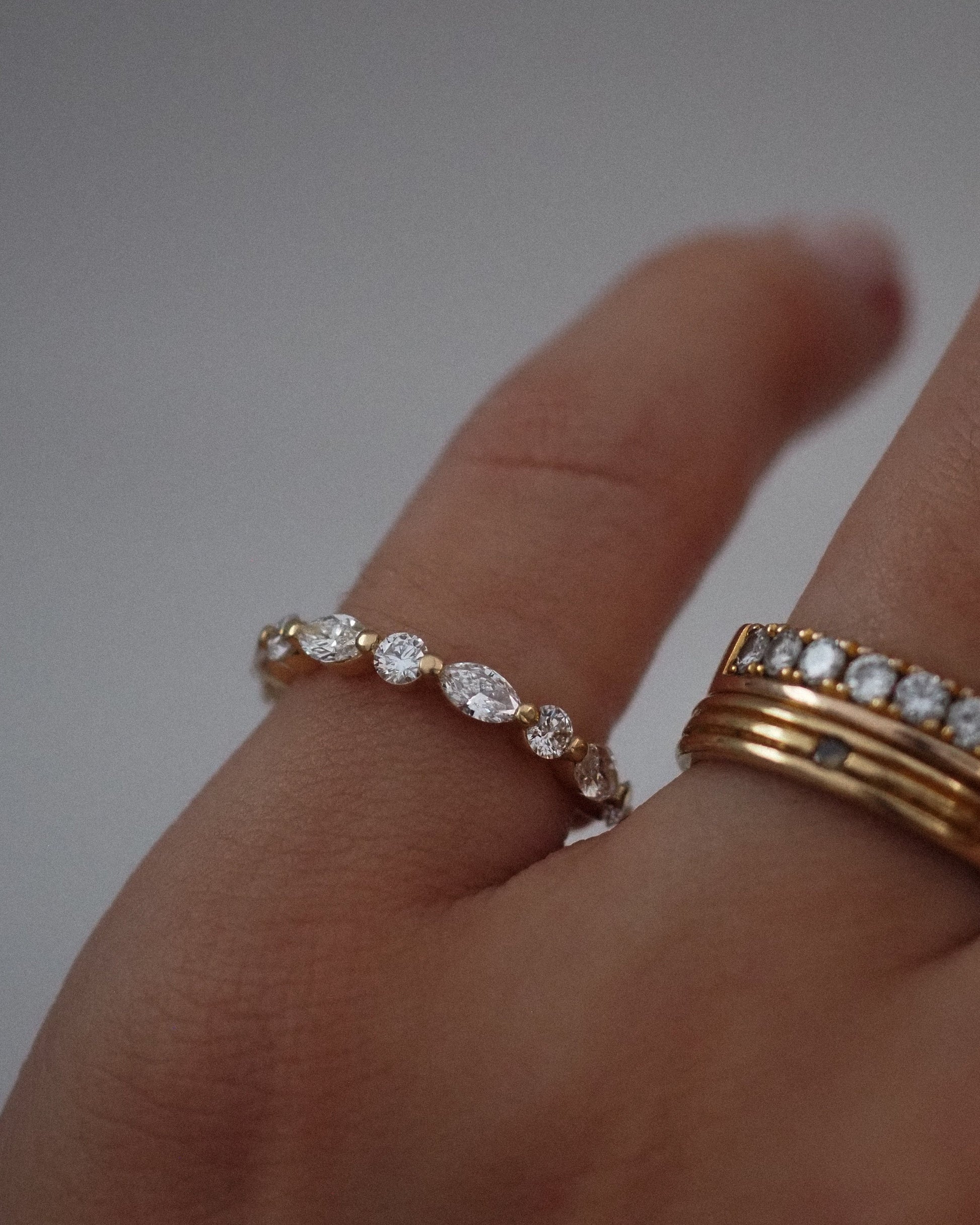 0.13 TCW Round Twisted Moissanite Wedding Band