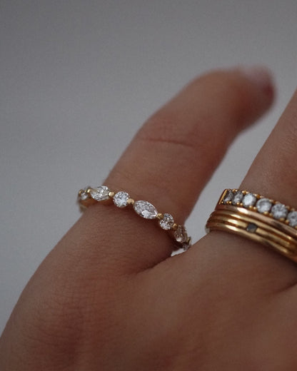 0.13 TCW Round Twisted Moissanite Wedding Band