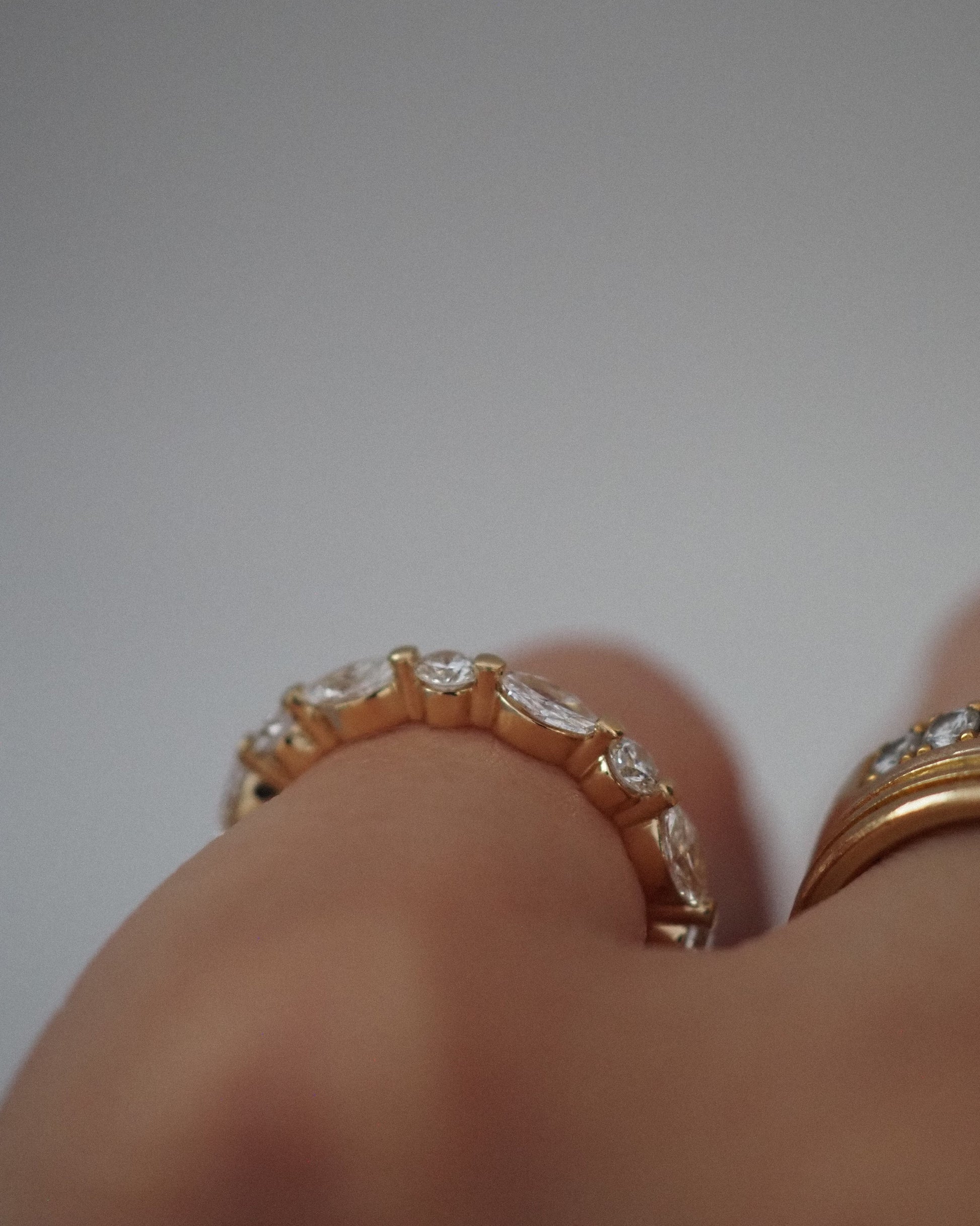 0.13 TCW Round Twisted Moissanite Wedding Band