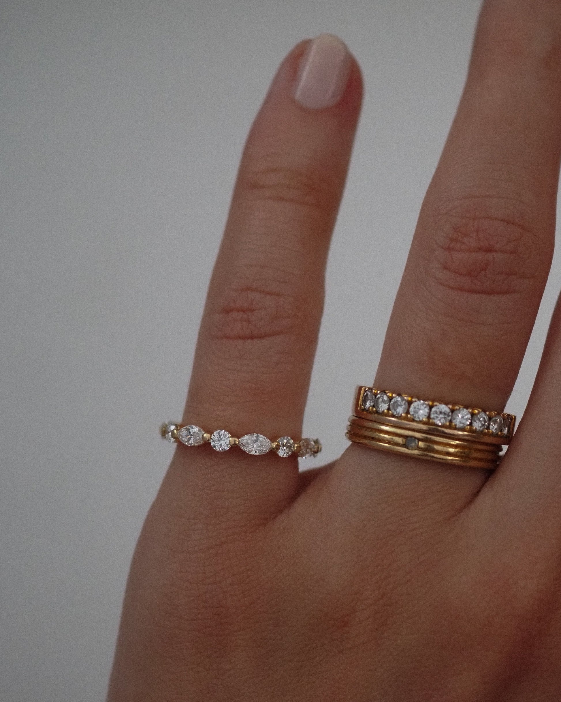 0.13 TCW Round Twisted Moissanite Wedding Band