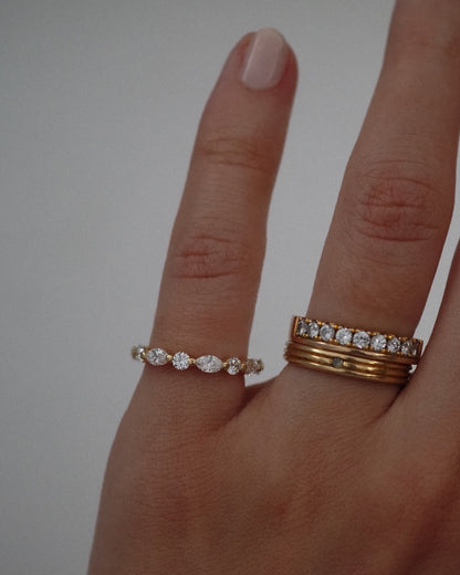0.13 TCW Round Twisted Moissanite Wedding Band