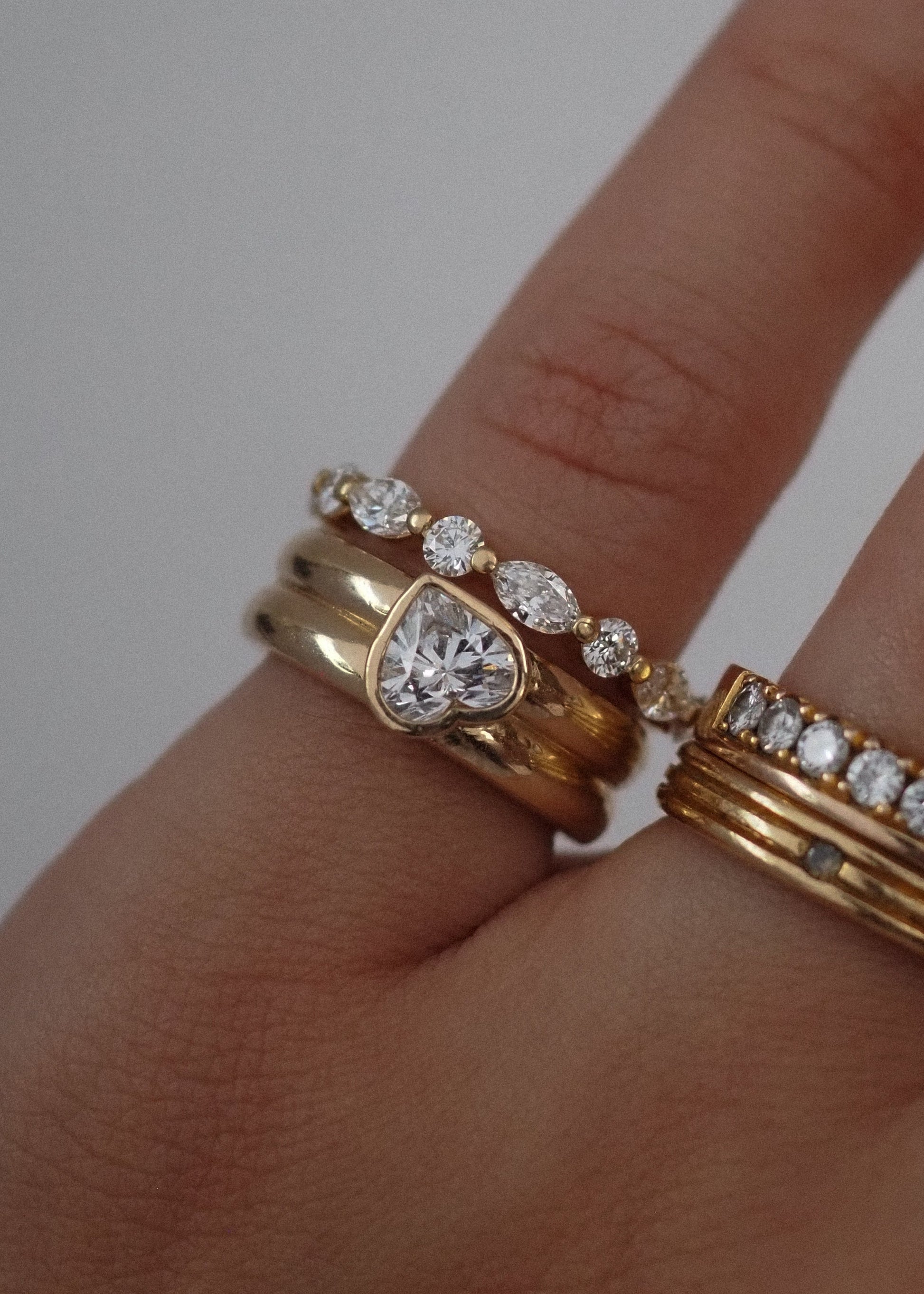 0.13 TCW Round Twisted Moissanite Wedding Band
