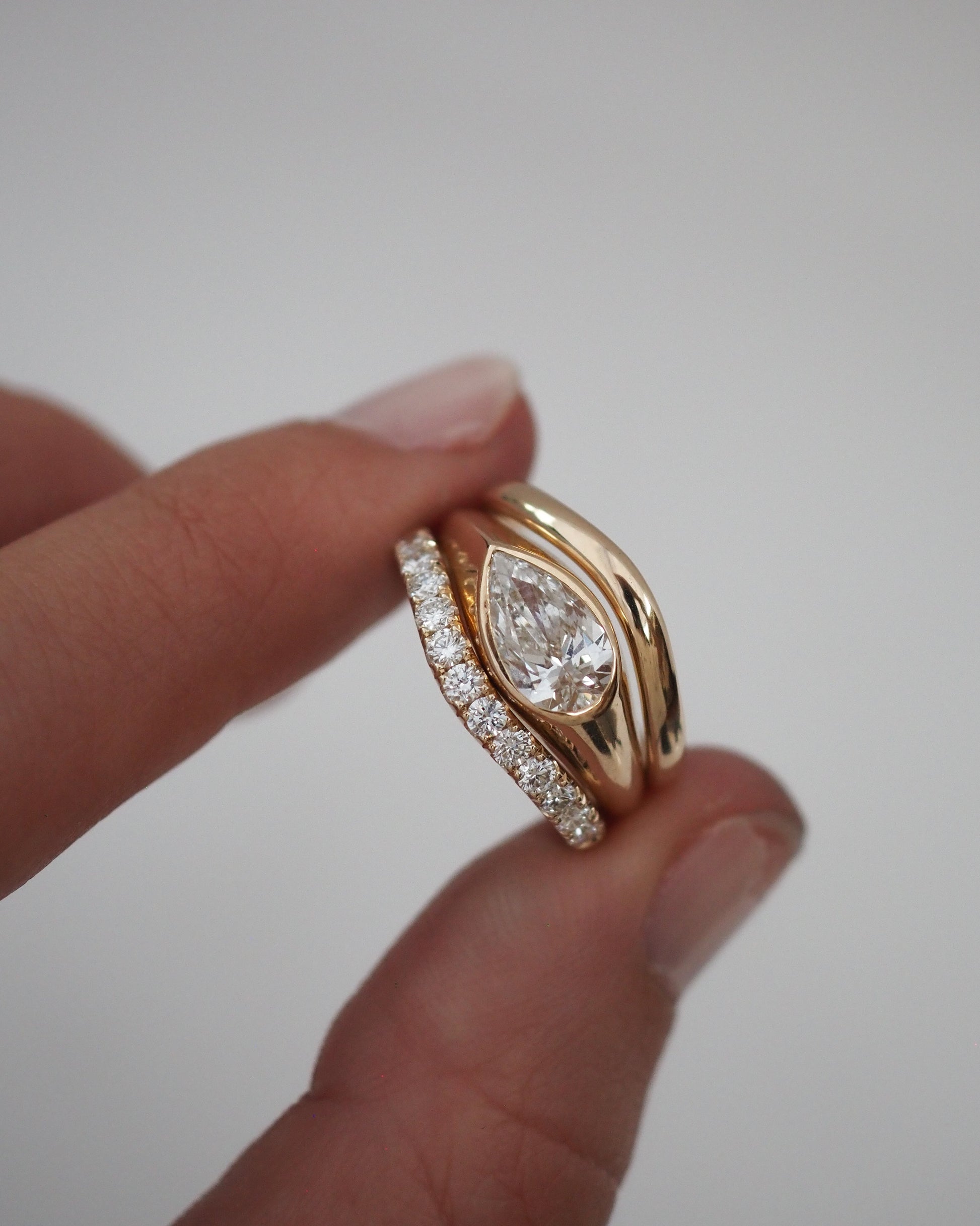 0.13 TCW Round Twisted Moissanite Wedding Band