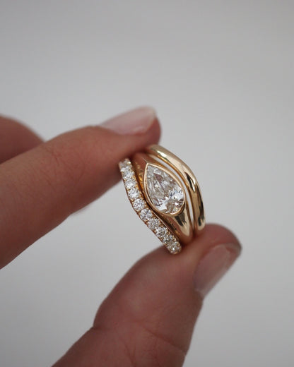 0.13 TCW Round Twisted Moissanite Wedding Band