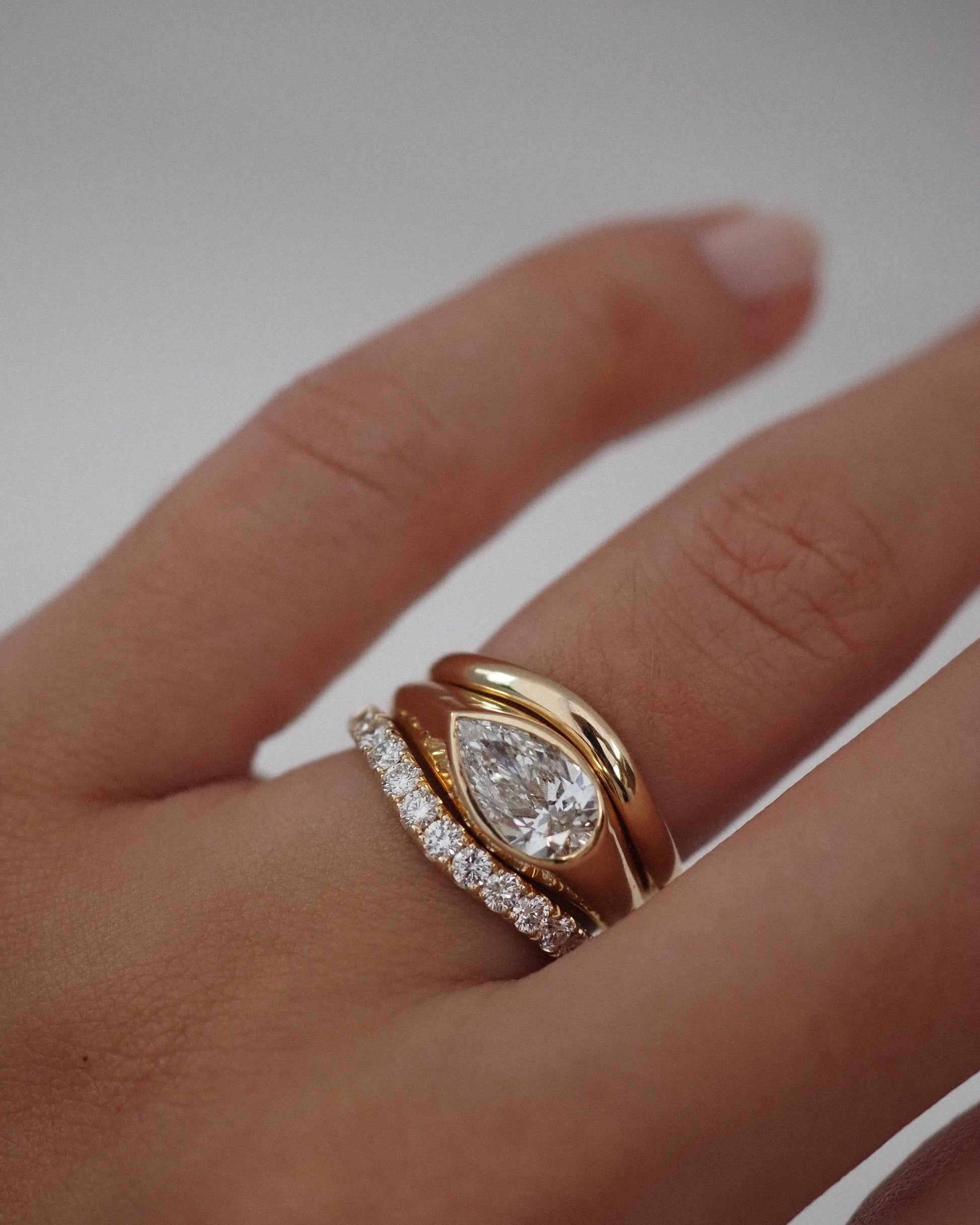 0.13 TCW Round Twisted Moissanite Wedding Band