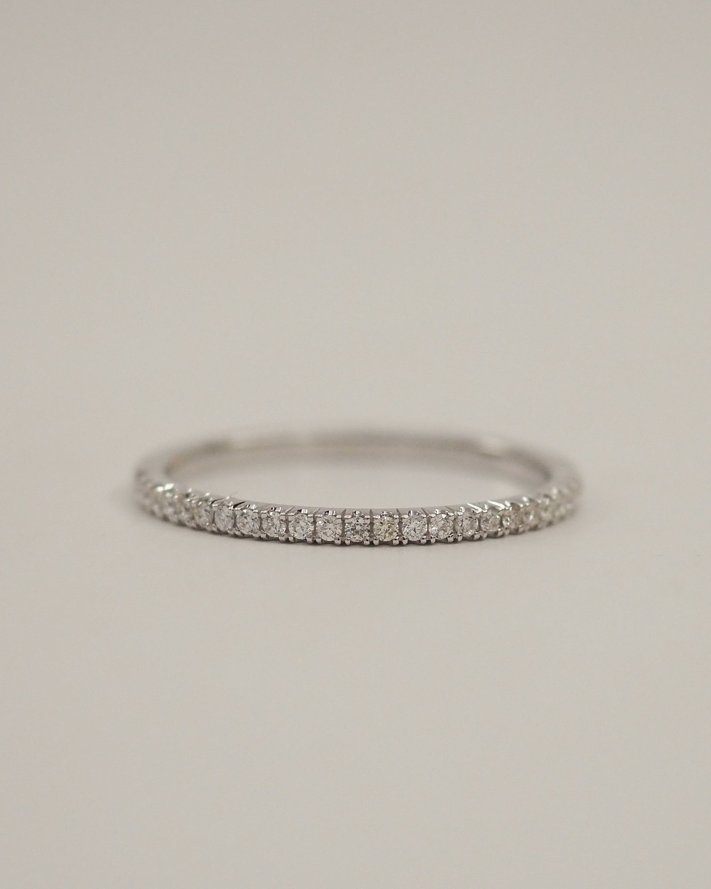 0.13 TCW Round Twisted Moissanite Wedding Band