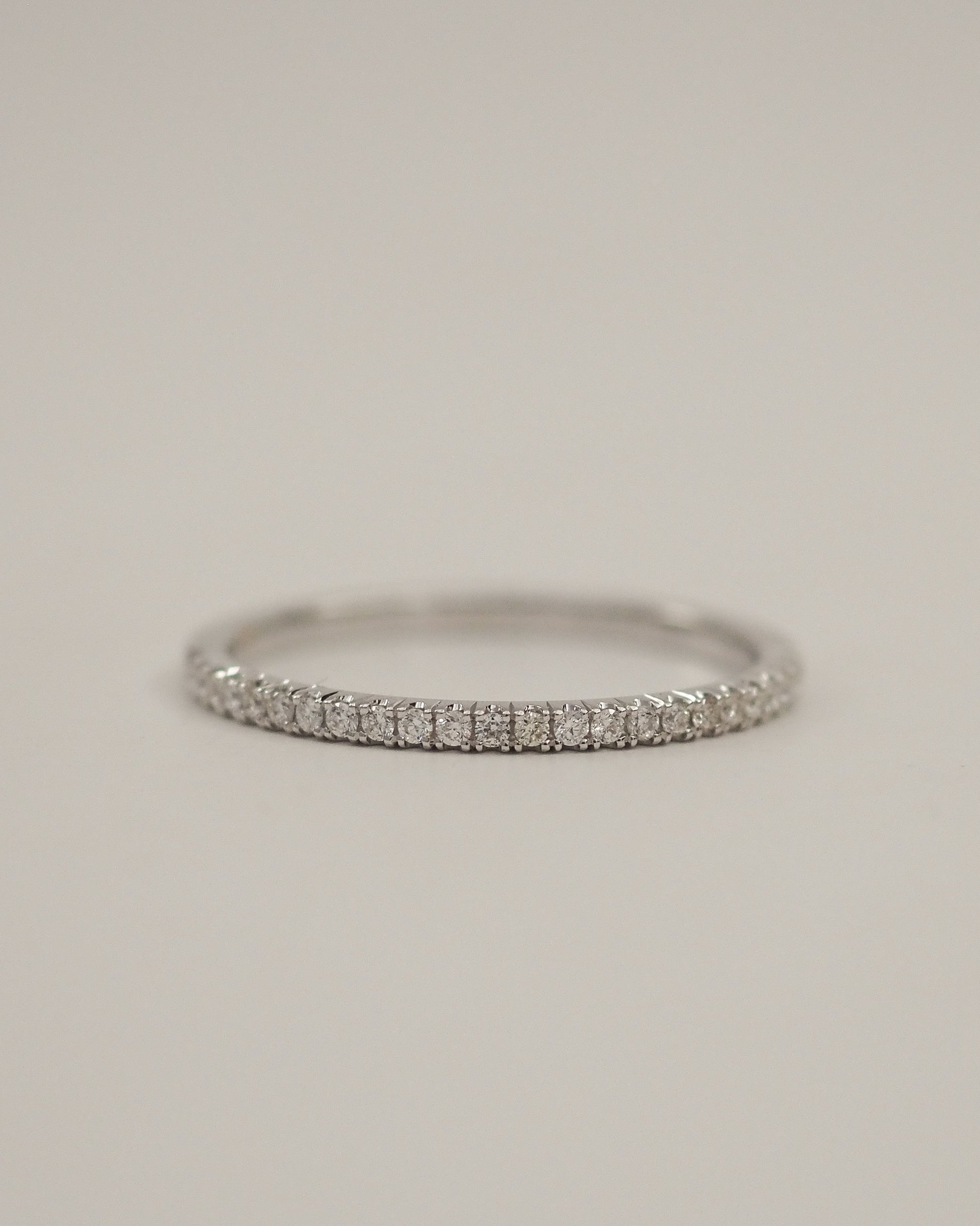 0.13 TCW Round Twisted Moissanite Wedding Band