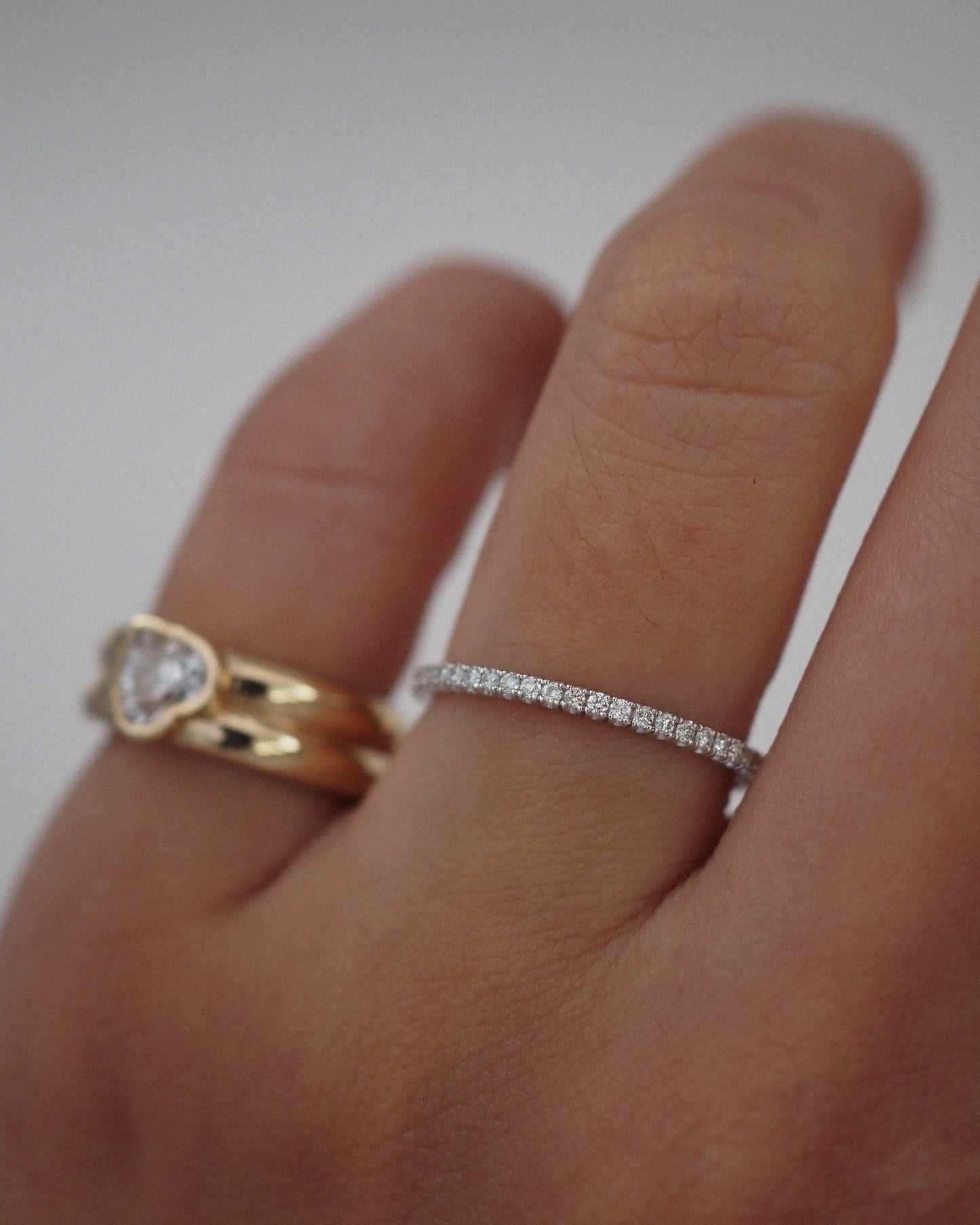 0.13 TCW Round Twisted Moissanite Wedding Band