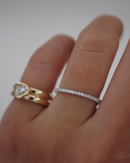 0.13 TCW Round Twisted Moissanite Wedding Band