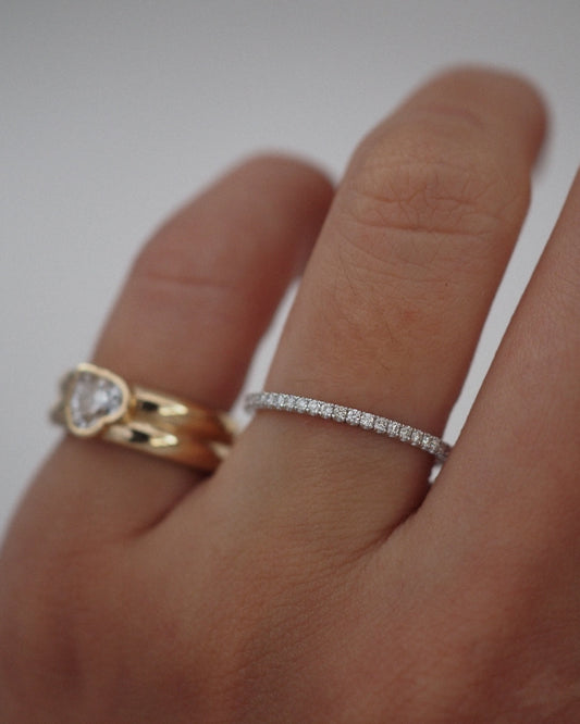 0.13 TCW Round Twisted Moissanite Wedding Band